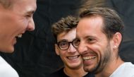 (FILES) In this file photograph taken on July 5, 2017 (L/R): Polevaulters Sam Kendricks of the US, Armand Duplantis of Sweden and Renaud Lavillenie of France react after a press conference on the eve of the Diamond League athletics meeting Athletissima in