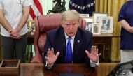 :U.S. President Donald Trump speaks before signing a proclamation in honor of National Nurses Day in the Oval Office at the White House in Washington, U.S., May 6, 2020. REUTERS/Tom Brenner
