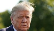 US President Donald Trump arrives to speak to the press before departing from the South Lawn of the White House in Washington, DC on May 15, 2020. Trump is heading to Camp David presidential retreat in Maryland. / AFP / MANDEL NGAN
