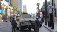 National Guards and armored trucks are patrolling Hollywood boulevard between the Dolby theatre and El capitan theatre in Hollywood on May 31, 2020.  / AFP / Javier TOVAR
