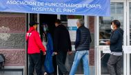 People enter the El Pino hospital to undergo COVID-19 tests, in Santiago, on June 15, 2020, amid the novel coronavirus pandemic. Chile renewed for three months the 