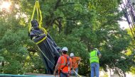 Christopher Columbus statue is being removed in Tower Grove Park, St. Louis, Missouri, U.S., June 16, 2020. in this picture obtained from social media. DOYLE MURPHY / RIVERFRONT TIMES via REUTERS 