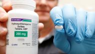 FILE PHOTO: The drug Hydroxychloroquine, pushed by U.S. President Donald Trump and others in recent months as a possible treatment to people infected with the coronavirus disease (COVID-19), is displayed by a pharmacist at the Rock Canyon Pharmacy in Prov