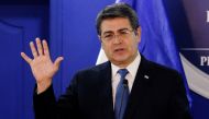 FILE PHOTO: Honduras' President Juan Orlando Hernandez speaks during a joint message with U.S. Department of Homeland Security (DHS) acting Secretary Chad Wolf (not pictured), at the Presidential House in Tegucigalpa, Honduras January 9, 2020. REUTERS/Jor