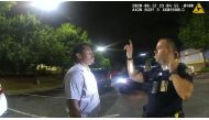 Former Atlanta Police Department officer Garrett Rolfe conducts a field sobriety test on 27-year-old Rayshard Brooks in a Wendy's restaurant parking lot in a still image from the video body camera of officer Devin Bronsan in Atlanta, Georgia, U.S. June 12