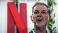 In this file photo taken on January 17, 2020 Co-founder and director of Netflix Reed Hastings delivers a speech as he inaugurates the new offices of Netflix France, in Paris. AFP / Christophe ARCHAMBAULT