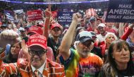 Supporters of U.S. President Donald Trump without protective face masks crowd near the stage for the president's nearly two hour long speech at his first re-election campaign rally in several months in the midst of the coronavirus disease (COVID-19) outbr