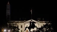 FILE PHOTO: The statue of U.S. President Andrew Jackson on his horse in the center of Lafayette Park is silhouetted against the White House in front of the Washington Monument (L) in Washington November 17, 2013. REUTERS/Jim Bourg/File Photo
