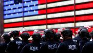 FILE PHOTO: New York Police Department (NYPD) officers are pictured as protesters rally against the death in Minneapolis police custody of George Floyd, in Times Square in the Manhattan borough of New York City, U.S., June 1, 2020. REUTERS/Mike Segar/File