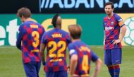 Barcelona's Argentine forward Lionel Messi (R) reacts during the Spanish League football match between Celta Vigo and Barcelona at the Balaidos stadium in Vigo on June 27, 2020. (AFP)