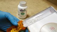 FILE PHOTO: The drug hydroxychloroquine is displayed by a pharmacist at a pharmacy in Provo, Utah, U.S., May 27, 2020. REUTERS/George Frey/File Photo
