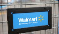 In this file photo the Walmart logo is displayed on a shopping cart at a Walmart store on August 15, 2013 in Chicago, Illinois.  / AFP / GETTY IMAGES NORTH AMERICA / SCOTT OLSON