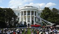 US President Donald Trump delivers remarks on Rolling Back Regulations to Help All Americans on the South Lawn at the White House on July 16, 2020 in Washington,DC. / AFP / JIM WATSON