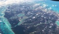 In this file photo taken on February 07, 2019 Aerial view of the Islands of the Bahamas. The Bahamas is barring visitors from the United States and Latin America in response to a rise in coronavirus cases in the archipelago three weeks after reopening its