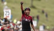Colombia's Egan Bernal of Team Ineos celebrates winning the 3rd stage of 163,5km between Saint-Gaudens and Col-de-Breyere in Le Garric, France, of the La Route d'Occitanie cycling race, on August 3, 2020. / AFP / POOL / Guillaume HORCAJUELO