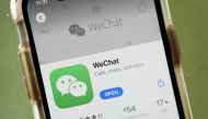 WASHINGTON, DC - AUGUST 07: In this photo illustration, the WeChat app is displayed in the App Store on an Apple iPhone on August 7, 2020 in Washington, DC. On Thursday evening, President Donald Trump signed an executive order that bans any transactions b