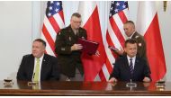 US Secretary of State Mike Pompeo and Poland's Minister of Defence Mariusz Blaszczak sign the US-Poland Enhanced Defence Cooperation Agreement in the Presidential Palace in Warsaw, Poland August 15, 2020. Janek Skarzynski/Pool via REUTERS