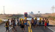 Kayapo indigenous people block Brazil's BR 163 national highway, as they protest against the government measures in the indigenous lands to avoid the spread of the coronavirus disease (COVID-19), in Novo Progresso, Para state, Brazil August 17, 2020. REUT