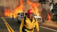 Chula Vista firefighter Rudy Diaz monitors the LNU Lightning Complex Fire as it engulfs brush in Lake County, California, U.S. August 23, 2020. REUTERS/Adrees Latif TPX IMAGES OF THE DAY