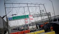 Cars stand in line at the Cordova International Bridge at the Mexico-U.S. border to enter into El Paso, Texas, in Ciudad Juarez, Mexico August 24, 2020. REUTERS/Jose Luis Gonzalez

