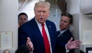 Campaign manager Bill Stepien stands alongside US President Donald Trump as he speaks with reporters aboard Air Force One as he flies from Manchester, New Hampshire to Joint Base Andrews in Maryland, August 28, 2020, following a campaign rally. / AFP / SA