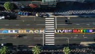 LOS ANGELES, CALIFORNIA - AUGUST 28: An aerial view of the new permanent 'All Black Lives Matter' mural after it was painted on Hollywood Boulevard on August 28, 2020 in Los Angeles, California. Mario Tama/Getty Images/AFP