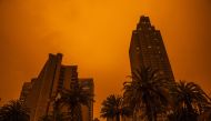 SAN FRANCISCO, CA - SEPTEMBER 09: An orange glow fills the sky above the Embarcadero as smoke from various wildfires burning across Northern California mixes with the marine layer, blanketing San Francisco in darkness, on September 9, 2020 in San Francisc