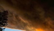 Thick smoke is seen above Salem City, Oregon, U.S., September 8, 2020, in this picture obtained from social media. Picture taken September 8, 2020. ZAK STONE/via REUTERS