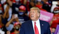 US President Donald Trump leaves the stage after speaking at a campaign event at Xtreme Manufacturing on September 13, 2020 in Henderson, Nevada. Ethan Miller/Getty Images/AFP 