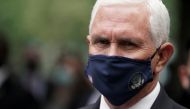 U.S. Vice President Mike Pence wears a protective face mask as he attends ceremonies marking the 19th anniversary of the September 11, 2001 attacks on the World Trade Center at the 911 Memorial & Museum in the Manhattan borough of New York City, New York,