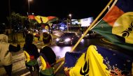 Kanak independence supporters wave flags of the Socialist Kanak National Liberation Front (FLNKS) after the referendum on independence on the French South Pacific territory of New Caledonia in Noumea on October 4, 2020. AFP / Theo Rouby