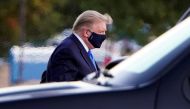 FILE PHOTO: U.S. President Donald Trump arrives at Walter Reed National Military Medical Center by helicopter after the White House announced that he 