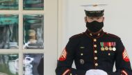 A US Marine is posted at the West Wing door, an indication that President Donald Trump is in the Oval Office as he remains out of public view while fighting the coronavirus disease (COVID-19) at the White House in Washington, U.S. October 9, 2020. Reuters