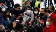 Peru's President Martin Vizcarra talks with journalists at the Jorge Chavez International Airport on its re-opening day for regular international commercial traffic after more than six months of lockdown following the coronavirus disease (COVID-19) outbre