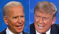 (COMBO) In this file combination of pictures created on September 29, 2020 Democratic Presidential candidate and former US Vice President Joe Biden (L) and US President Donald Trump speak during the first presidential debate at the Case Western Reserve Un