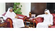 Qatar Chamber First Vice-Chairman Mohamed bin Ahmed bin Towar Al Kuwari (left) and the CEO of Investment Promotion Agency of Qatar, Sheikh Ali bin Alwaleed Al Thani, during their meeting held at the QC headquarters, yesterday. 