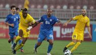 Al Gharafa and Al Kharaitiyat players in action during their Ooredoo Cup match yesterday.