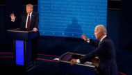 (FILES) In this file photo taken on September 29, 2020 US President Donald Trump and former Vice President and Democratic presidential nominee Joe Biden speak during the first presidential debate at the Health Education Campus of Case Western Reserve Univ