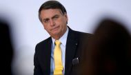 Brazil's President Jair Bolsonaro looks on during the COVID-19 Clinical Study Result Announcement Ceremony at the Planalto Palace in Brasilia, Brazil, October 19, 2020. REUTERS/Adriano Machado/File Photo