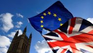 FILE PHOTO: British and EU flags flutter outside the Houses of Parliament in London, Britain January 30, 2019. REUTERS/Toby Melville/File Photo
