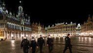 Police officers patrol Brussels' Grand Place during a nighttime curfew imposed by the Belgian government as the spread of the coronavirus disease (COVID-19) continues, in Brussels, Belgium October 20, 2020. REUTERS/Francois Lenoir
