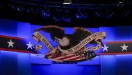 The Great Seal of the United States is seen above the stage for the final presidential debate of the US 2020 presidential elections at Belmont University on October 21,2020 in Nashville, Tennessee. / AFP / Brendan SMIALOWSKI