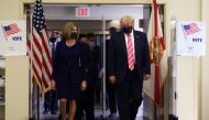 US President Donald Trump wearing a face mask leaves after voting in the 2020 presidential election at the Palm Beach County Library in West Palm Beach, U.S., October 24, 2020. (REUTERS/Tom Brenner)