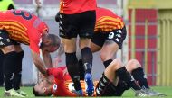 Benevento's Italian midfielder Roberto Insigne (C down) celebratres with his team mates after scoring a goal during the Italian Serie A football match between Benevento and Napoli on October 25, 2020 at the Ciro Vigorito stadium in Benevento, southern Ita