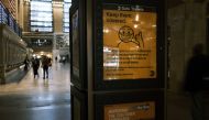 NEW YORK, NEW YORK - OCTOBER 21: A display at Grand Central Terminal shows how to wear a face mask on October 21, 2020 in New York City. Spencer Platt/AFP