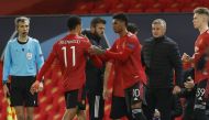 Soccer Football - Champions League - Group H - Manchester United v RB Leipzig - Old Trafford, Manchester, Britain - October 28, 2020 Manchester United's Marcus Rashford comes on as a substitute to replace Mason Greenwood as manager Ole Gunnar Solskjaer lo