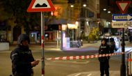 Police officers secure an area after exchanges of gunfire in Vienna, Austria November 3, 2020. REUTERS/Radovan Stoklasa