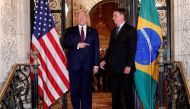 FILE PHOTO: U.S. President Donald Trump hosts a photo-op with Brazilian President Jair Bolsonaro before attending a working dinner at the Mar-a-Lago resort in Palm Beach, Florida, U.S., March 7, 2020. REUTERS/Tom Brenner/File Photo
