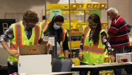 PHILADELPHIA, PENNSYLVANIA - NOVEMBER 04: Election workers count ballots on November 04, 2020 in Philadelphia, Pennsylvania. With no winner declared in the presidential election last night, all eyes are on the outcome in a few remaining swing states to de