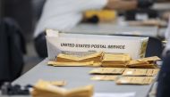 Absentee ballots at the Central Counting Board sit on a desk as they wait to be processed in the TCF Center on November 4, 2020 in Detroit, Michigan. Elaine Cromie/Getty Images/AFP